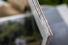 Hahnemuhle Baryta Bamboo fine art album from QTALBUMS with choice of regular straight-cut page edges, or hand-torn, deckled-edge pages. 