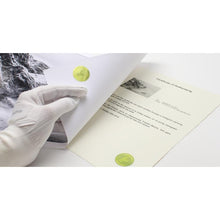 Safeguard the integrity of your artwork with a distinguished hologram certificate of authenticity. Available with Hahnemuhle Baryta Bamboo fine art albums from QTALBUMS.