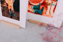 Matted Prints on Wood Stands