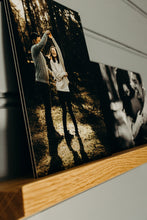 Thick mounted photo prints display shelf